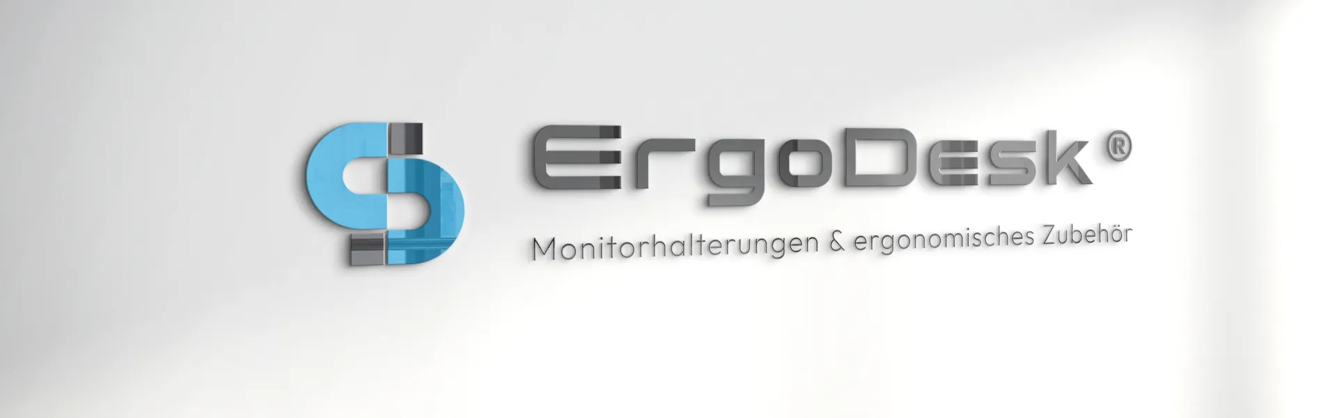 Logo von Ergodesk in modernem Design, schlicht und ansprechend mit einem ergonomischen Touch.